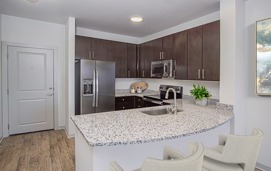 Apartments on south tryon charlotte nc - Gramercy Square at Ayrsley - kitchen appliances