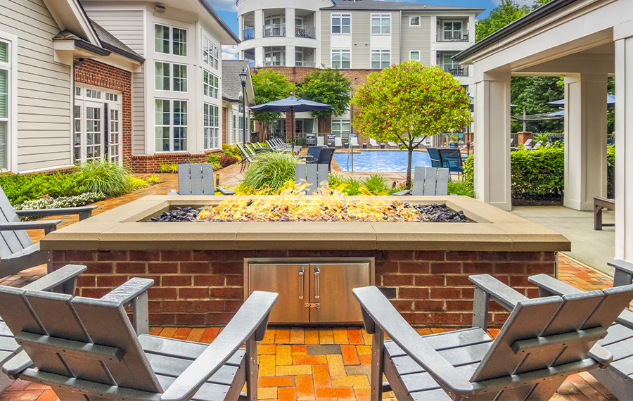 Apartments near Charlotte Douglas International Airport - Gramercy Square at Ayrsley - Poolside Lounge