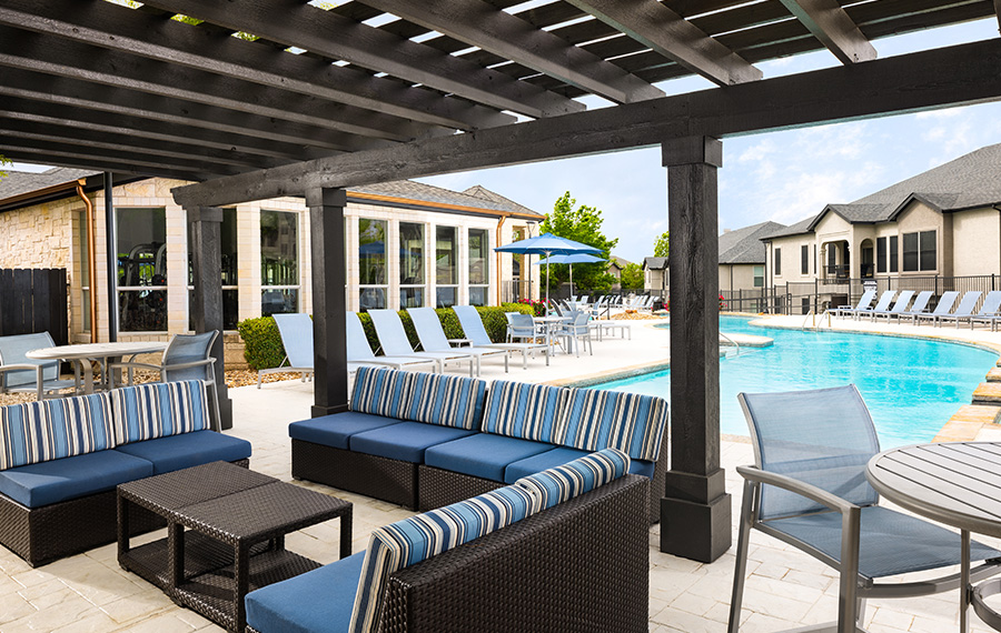 Glenhaven at Star Ranch - Apartments For Rent in Hutto, TX - poolside seating