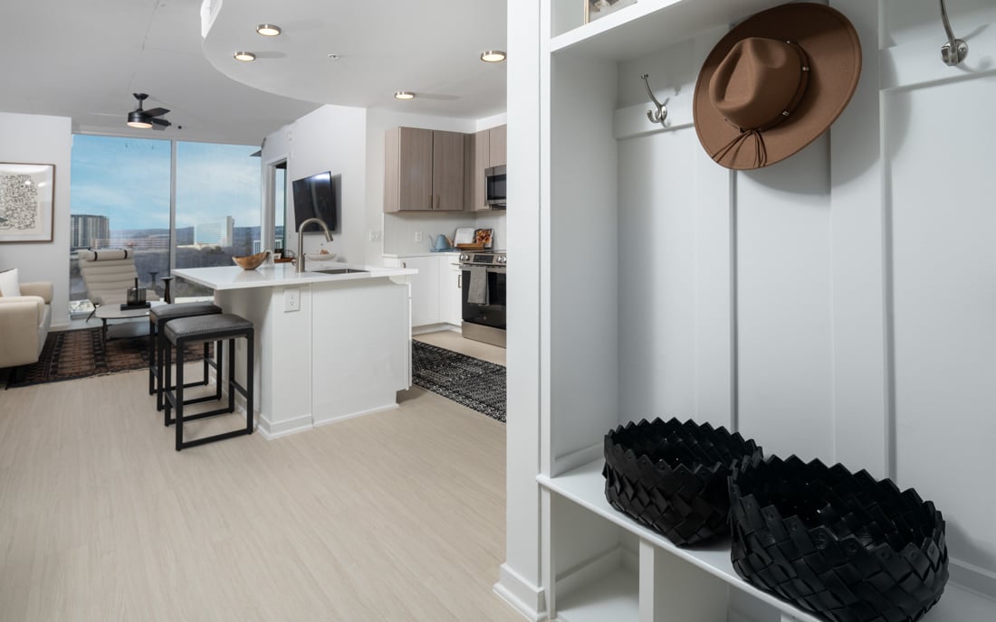 Austin tx apartments downtown - SkyHouse Austin poolside terrace with outdoor TV's and fireplace