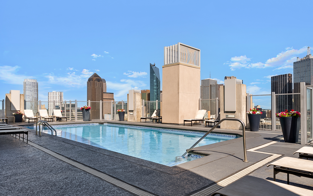 SkyHouse Dallas - Rooftop pool lounge with downtown views - High Rise Apartments Uptown Dallas