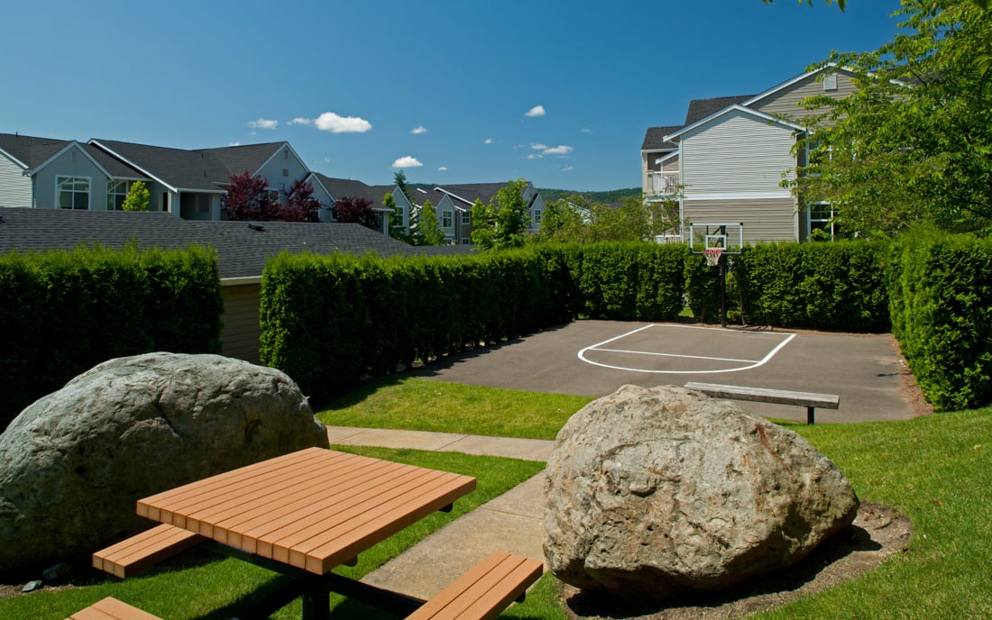 The Timbers at Issaquah Ridge apartments in Snoqualmie Falls - Outdoor basketball and sports court 