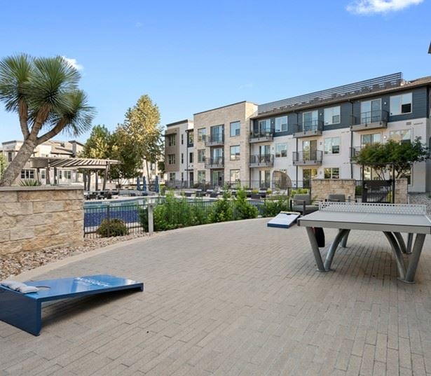 Austin apartments for rent near IBM - The Addison Apartments Outdoor kitchen with BBQ grills 
