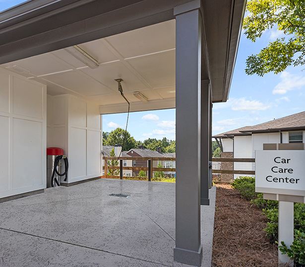 apartments in gwinnett county - Artisan Station Apartments car care center