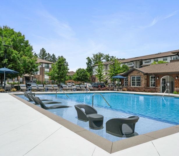 Adams Creek apartments near Mall of Georgia - Artisan Station Apartments pool