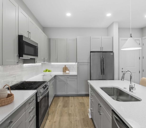 Gourmet Kitchen with Quartz Countertops | Brooking Square Rentals on the Waterline