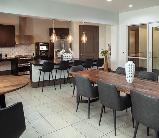 Apartments near MD Anderson Hospital - District At Greenbriar Clubhouse with demonstration kitchen