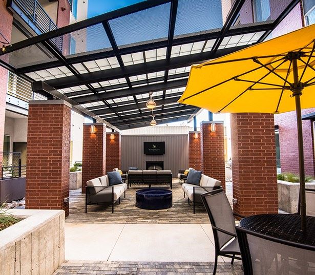 Hartley Flats Courtyard Lounge with TV Denver CO - RiNo