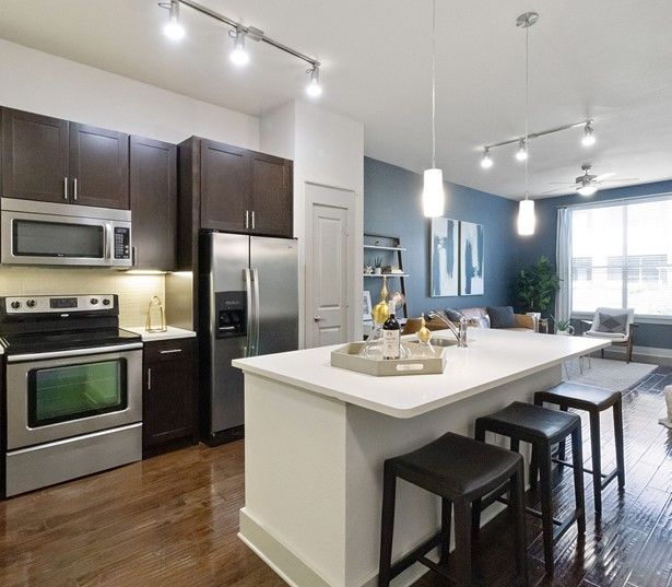 The Icon at Ross features stainless steel appliances - Apartments in Deep Ellum