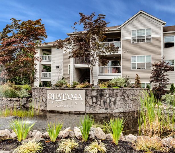 Beaverton apartments near Poynter Middle School - Quatama Crossing Entrance water feature