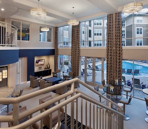 Raleigh, NC Apartments in North Hills - Marshall Park Two story clubhouse overlooking the pool