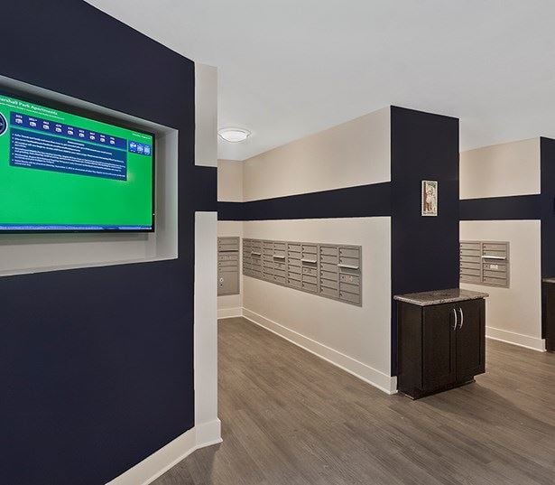 Crabtree Apartments in Raleigh near Red Hat - Marshall Park mail room with package notification