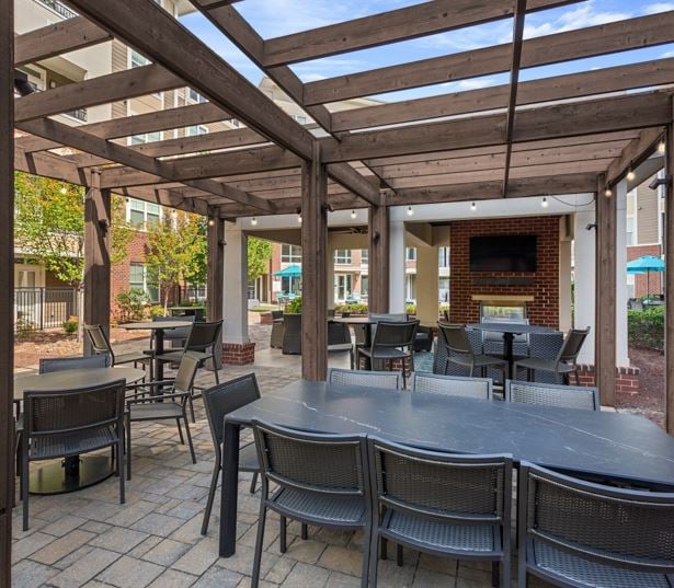 apartments near crabtree - Marshall Park Courtyard with pool side outdoor kitchen and TV Lounge