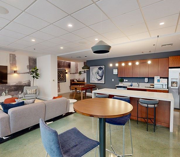 The Matisse apartments for rent by Tillicum Bridge - Game room with consoles large screen TV