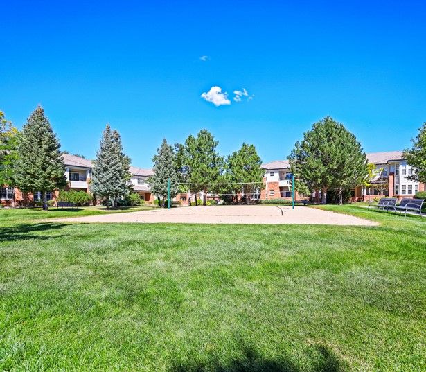 Ridgegate apartments for rent in Parker - The Meadows At Meridian offers sand volleyball court