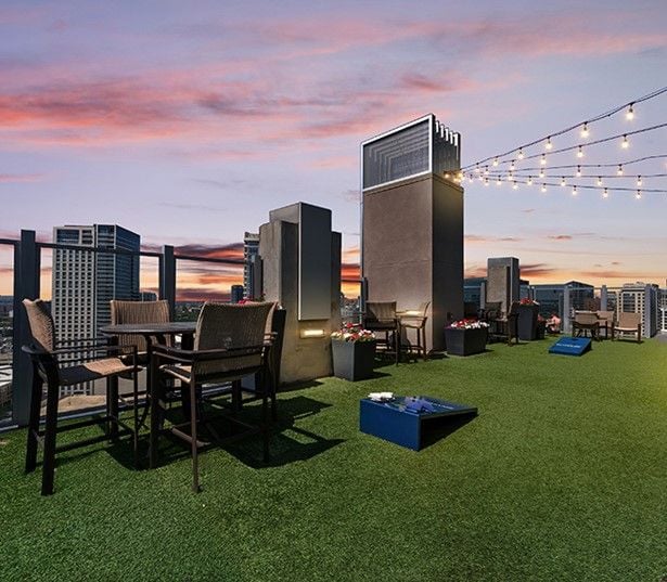 SkyHouse Dallas - bedroom - Park District Apartments near Klyde Warren Park
