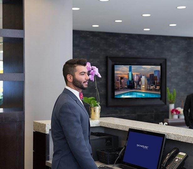 SkyHouse Dallas - on-site concierge - Park District Apartments near Klyde Warren Park