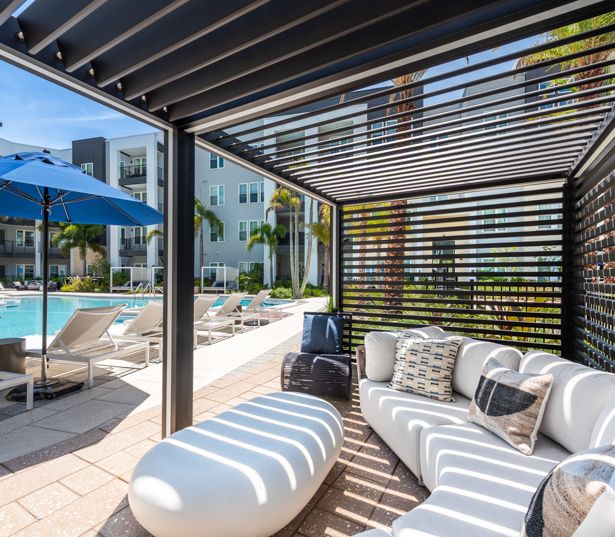 Pet Friendly Apartments in Tampa, FL - The Residence Peninsula Apartments - Poolside Lounge