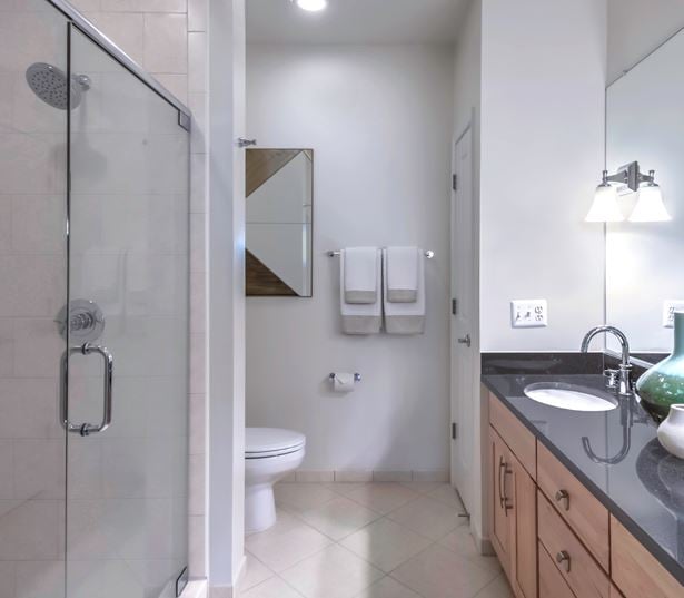 apartments in vienna va - The Reserve at Tysons Corner Spa bathrooms