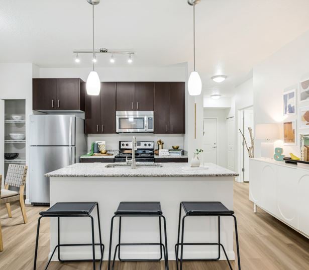 Victory Flats apartments for rent in Cedar Hills near Nike Headquarters - wood style plank flooring