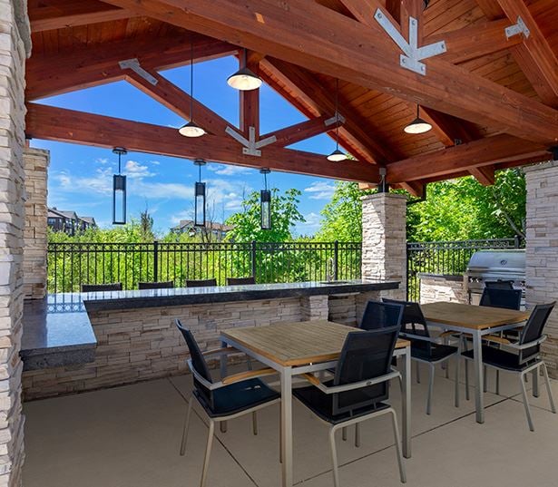 Victory Flats apartments in Cedar Hills - Resort style pool with gazebo lounge seating