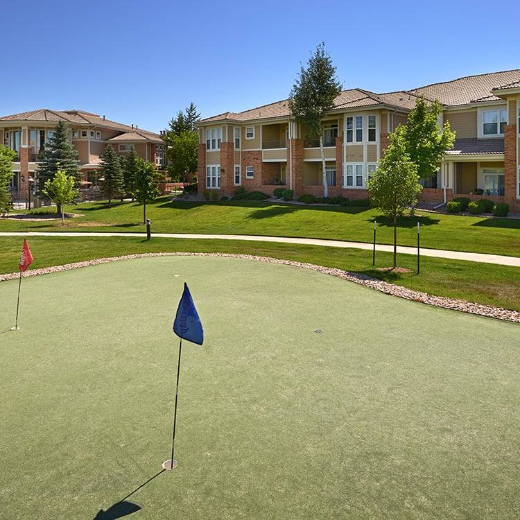 lone tree co apartments near Charles Schwab - Meadows At Meridian putting green