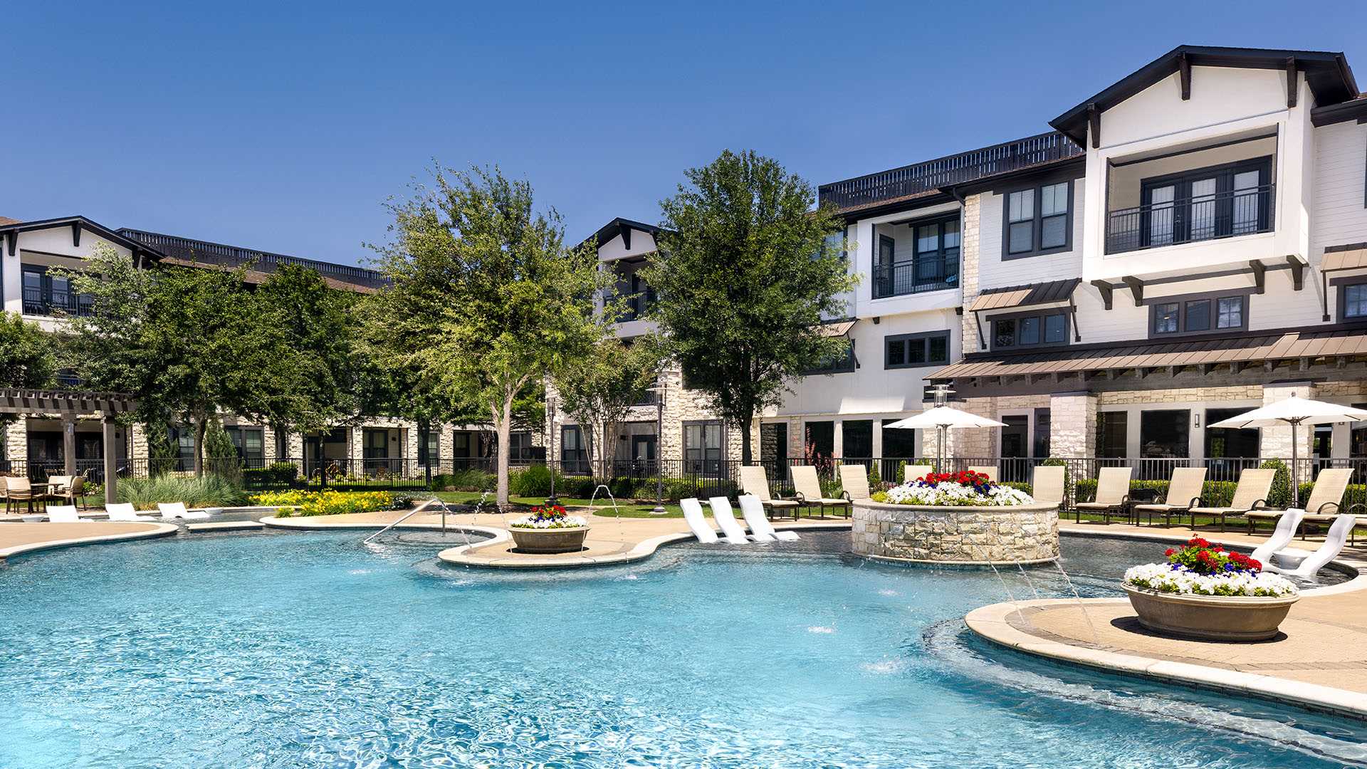 StoneLedge Apartments - Poolside dusk - Grapevine TX Apartments