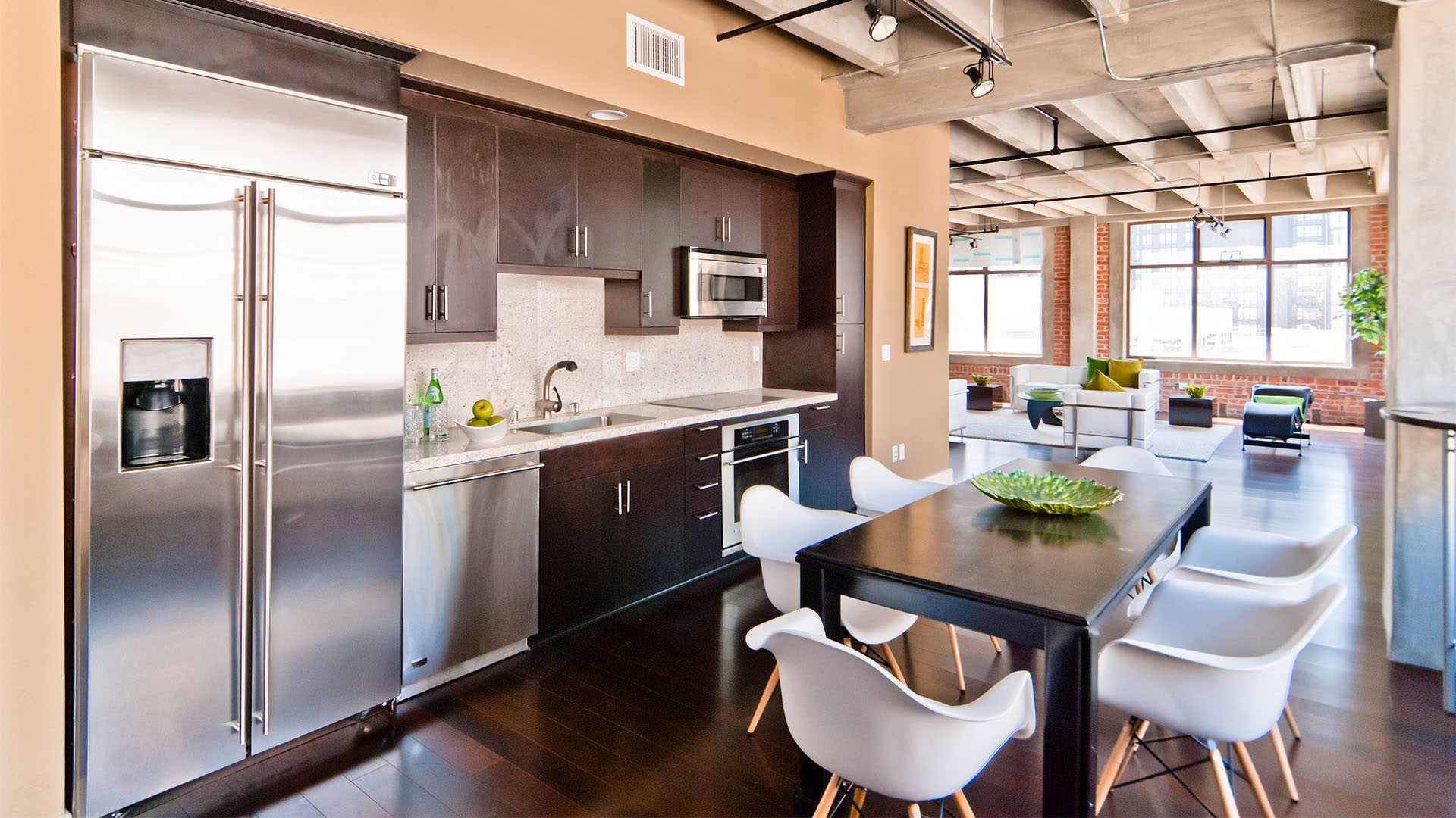 LA Live loft apartments for rent in LA - The Brockman Lofts Modern upgraded kitchen with stainless steel appliances