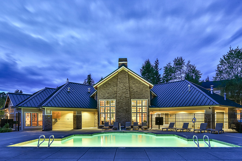The Lodge at Redmond Ridge Apartments in Redmond, WA - Pool at Twilight